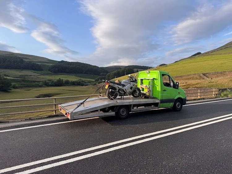 Bike on recovery truck